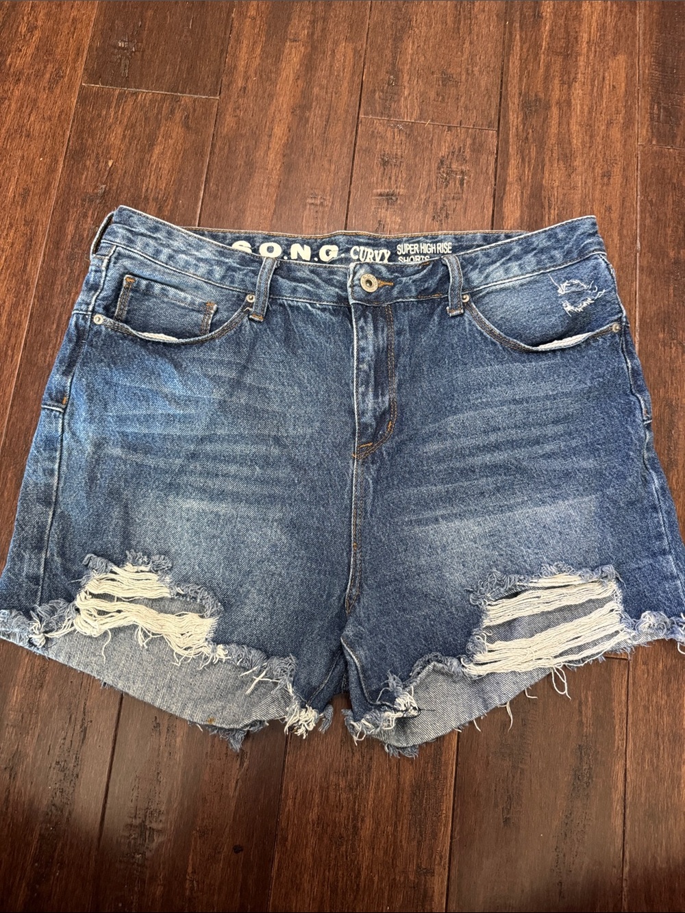 Distressed High-Rise Curvy Denim Shorts